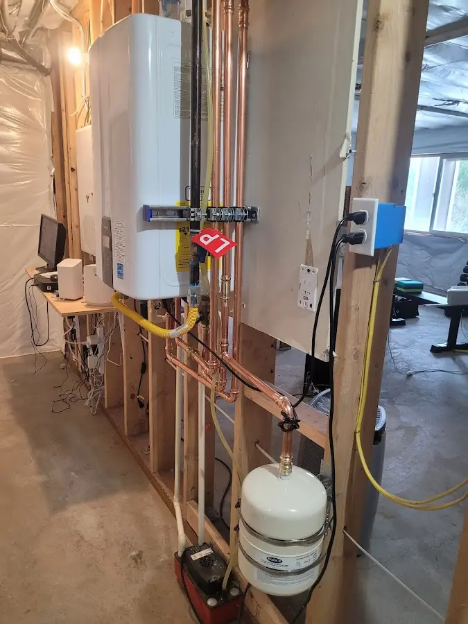 Licensed plumber repairing a kitchen sink in Manning